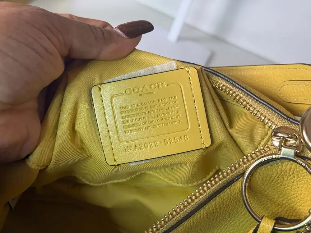 Coach Polished Pebble Leather Huda Hobo Bag in Bright Yellow